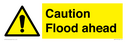 caution-flood-ahead--warning-sign-with-general-warning~